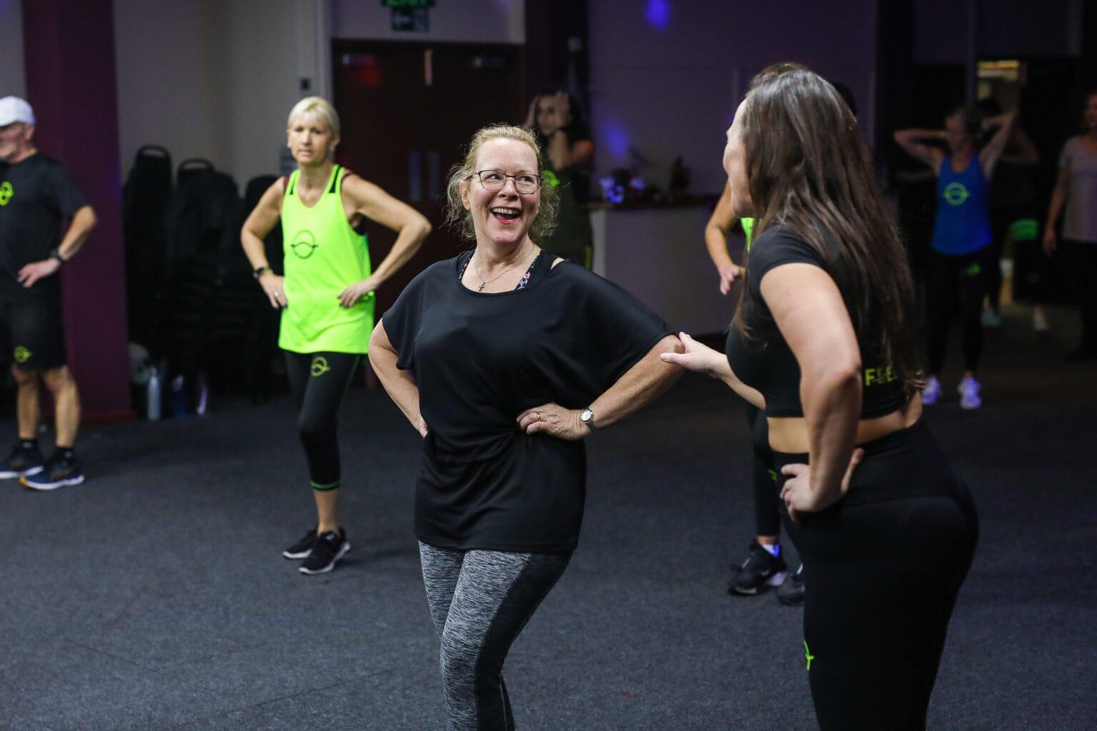 Vibe Life community fitness group smiling outdoors